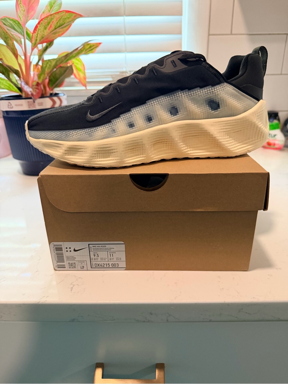 Nike Men’s Black and Cream Textured Sole Athletic Sneakers